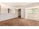 Open living room area with carpet and large windows offering ample natural light at 4648 N 40Th St, Phoenix, AZ 85018