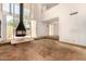 Open living room offers fireplace, large windows, and modern design elements at 4648 N 40Th St, Phoenix, AZ 85018