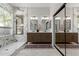 Elegant bathroom with double vanity, marble accents, and glass enclosed shower at 5330 W Folley W St, Chandler, AZ 85226