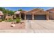 Attractive single-story home featuring a well-maintained yard and a spacious three-car garage at 5330 W Folley W St, Chandler, AZ 85226