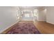 Inviting living room featuring sleek hardwood floors and a modern chandelier at 5330 W Folley W St, Chandler, AZ 85226