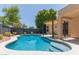 Stunning pool area with lush trees and covered patio, perfect for outdoor relaxation at 5330 W Folley W St, Chandler, AZ 85226