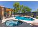 Inviting pool area with a hot tub and covered patio, perfect for outdoor entertaining at 5330 W Folley W St, Chandler, AZ 85226