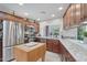 Beautiful kitchen with granite countertops, stainless steel appliances, and ample cabinet space at 5410 E Poinsettia Dr, Scottsdale, AZ 85254