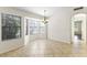 Dining area featuring a bay window and decorative chandelier at 5450 E Paradise Ln, Scottsdale, AZ 85254