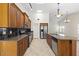 Kitchen with granite countertops, stainless appliances, and skylight at 5450 E Paradise Ln, Scottsdale, AZ 85254