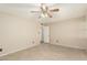 Spacious bedroom with tile flooring, ceiling fan and neutral paint at 6025 N 10Th Pl, Phoenix, AZ 85014