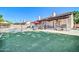 Expansive backyard with a pool, patio, and well-maintained turf at 6708 W Utopia Rd, Glendale, AZ 85308