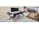 Bright game room featuring an air hockey table, adjoining dining space, and a fun recreational atmosphere at 6708 W Utopia Rd, Glendale, AZ 85308