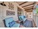 Cozy outdoor patio area with comfortable seating and stylish decor at 6708 W Utopia Rd, Glendale, AZ 85308