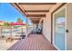 Covered patio with a view of the pool, ideal for outdoor dining at 6708 W Utopia Rd, Glendale, AZ 85308