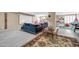 Versatile recreation room with movie area, comfortable seating, and space for various activities and entertainment at 6708 W Utopia Rd, Glendale, AZ 85308