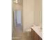 Neutral bathroom featuring a modern sink and vanity, tile flooring, and recessed lighting at 674 E Renegade Pl, San Tan Valley, AZ 85143