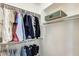 Walk-in closet with hanging clothes and shelving, providing ample storage space at 699 S 197Th Dr, Buckeye, AZ 85326