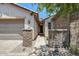 Pathway to a home's entry with lovely rock accents and appealing curb appeal at 699 S 197Th Dr, Buckeye, AZ 85326