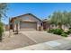 Inviting single-Gathering home with a large driveway and attractive landscaping at 699 S 197Th Dr, Buckeye, AZ 85326