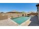 Backyard swimming pool with lounge chairs and patio, perfect for outdoor enjoyment at 699 S 197Th Dr, Buckeye, AZ 85326