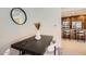 Cozy dining area with modern table, stylish chairs, and decorative mirror at 7151 E Rancho Vista Dr # 6002, Scottsdale, AZ 85251