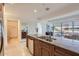 Spacious kitchen featuring an island with granite countertops, ample storage, and stainless appliances at 7151 E Rancho Vista Dr # 6002, Scottsdale, AZ 85251