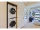 Convenient stackable washer and dryer unit next to the living room at 7151 E Rancho Vista Dr # 6002, Scottsdale, AZ 85251