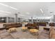 Comfortable lounge area with sofas, tables, and access to the gym and pool at 7151 E Rancho Vista Dr # 6002, Scottsdale, AZ 85251