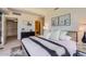 Inviting main bedroom with a modern bed, decor, and ensuite bathroom with walk-in closet at 7151 E Rancho Vista Dr # 6002, Scottsdale, AZ 85251