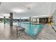 Well-lit indoor pool with accessible entry and large windows offering views at 7151 E Rancho Vista Dr # 6002, Scottsdale, AZ 85251