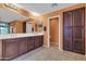 Bathroom featuring a double sink vanity, a large mirror and tile flooring at 742 E Kingbird Dr, Gilbert, AZ 85297