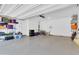 Spacious two-car garage with ample storage, organization, and a clean, bright interior at 742 E Kingbird Dr, Gilbert, AZ 85297