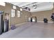 A garage with storage racks, mirrors and solar equipment at 742 E Kingbird Dr, Gilbert, AZ 85297