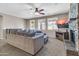 Spacious living room featuring neutral walls, and an oversized sectional sofa at 742 E Kingbird Dr, Gilbert, AZ 85297