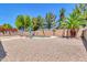 Inviting backyard oasis with a sparkling pool, lounge chairs, and lush landscaping at 742 E Kingbird Dr, Gilbert, AZ 85297