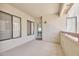 A spacious covered balcony with exterior door and plenty of natural light at 750 E Northern Ave # 2088, Phoenix, AZ 85020