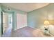 Comfortable bedroom features a large closet with sliding doors, soft carpet, and calming color scheme at 750 E Northern Ave # 2088, Phoenix, AZ 85020