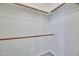 Walk-in closet with rod storage and shelving, providing an efficient use of space for organization at 750 E Northern Ave # 2088, Phoenix, AZ 85020