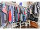 Walk-in closet featuring ample hanging space and shoe racks for optimal organization at 7923 W Hess Ave, Phoenix, AZ 85043