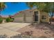 Charming two-story home with a three car garage and desert landscaping at 7923 W Hess Ave, Phoenix, AZ 85043
