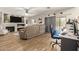 Cozy living room with wood floors, fireplace and backyard access at 7923 W Hess Ave, Phoenix, AZ 85043