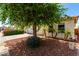 Charming single story home with a two-car garage and xeriscaped front yard and red tile roof at 8341 W Cypress St, Phoenix, AZ 85037