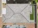 Aerial view of a gray tile roof with multiple skylights and unique design at 880 S 150Th Dr, Goodyear, AZ 85338