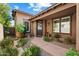 Inviting home entrance with manicured landscaping and a stylish front door at 9262 E Desert Park Dr, Scottsdale, AZ 85255