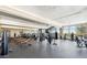 Well-equipped gym featuring weight machines, treadmills, and free weights, set against the backdrop of large windows at 9262 E Desert Park Dr, Scottsdale, AZ 85255