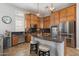 Spacious kitchen with granite countertops, an island, and stainless steel appliances at 9262 E Desert Park Dr, Scottsdale, AZ 85255