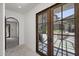 Elegant courtyard with lush greenery and geometric stone-and-grass paving at 9290 E Thompson Peak Pkwy # 470, Scottsdale, AZ 85255