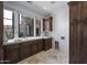 Well-appointed laundry room featuring granite countertops and ample cabinet space at 9290 E Thompson Peak Pkwy # 470, Scottsdale, AZ 85255