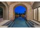 Outdoor oasis with a refreshing pool and serene desert views reflecting in the water at 9290 E Thompson Peak Pkwy # 470, Scottsdale, AZ 85255