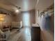 Cozy Bedroom featuring a crib, rocking horse, soft rug, and decor creating a warm and welcoming environment at 10029 S 44Th St, Phoenix, AZ 85044