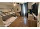 Functional bedroom featuring a bunk bed, dresser, and TV, offering a practical and comfortable living space at 10029 S 44Th St, Phoenix, AZ 85044