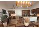 Spacious kitchen featuring granite countertops, stainless steel appliances, custom cabinets, and a charming breakfast nook at 10029 S 44Th St, Phoenix, AZ 85044