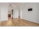 Spacious bedroom with hardwood floors and ensuite bathroom access at 11640 N Tatum Blvd # 2012, Phoenix, AZ 85028